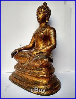 Ancien Bouddha en bronze doré Thaïlande
