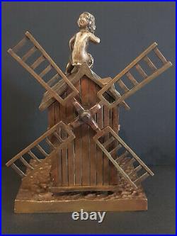 Ancienne tirelire moulin à vent en bronze