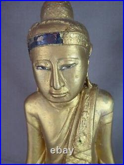 BOUDDHA DEBOUT, en bois doré. Ancien