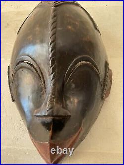 Grand masque ancien tribal africain en bois a identifier