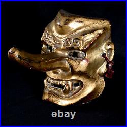 Masque Tengu en terre cuite doré, Japon inscriptions à l'intérieur