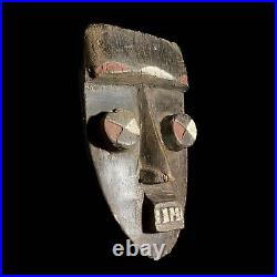 Masque africain suspendu au mur, Art primitif, masque Grebo, yeux
