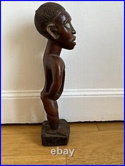 Statue africaine art tribal statue en bois patine brun rouge et cavité Congo