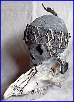 Tribal Clay Human Skull tied on an Animal Skull Indonesia age unknown