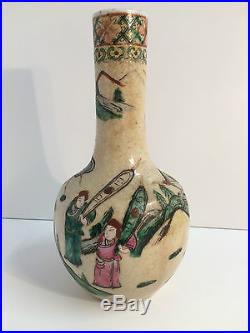 Vase chinois ancien a col long en grès émaillé décor de cavaliers
